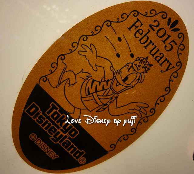東京ディズニーランドのペニーアーケードの2015年2月マンスリースーベニアメダル（節分のドナルド）